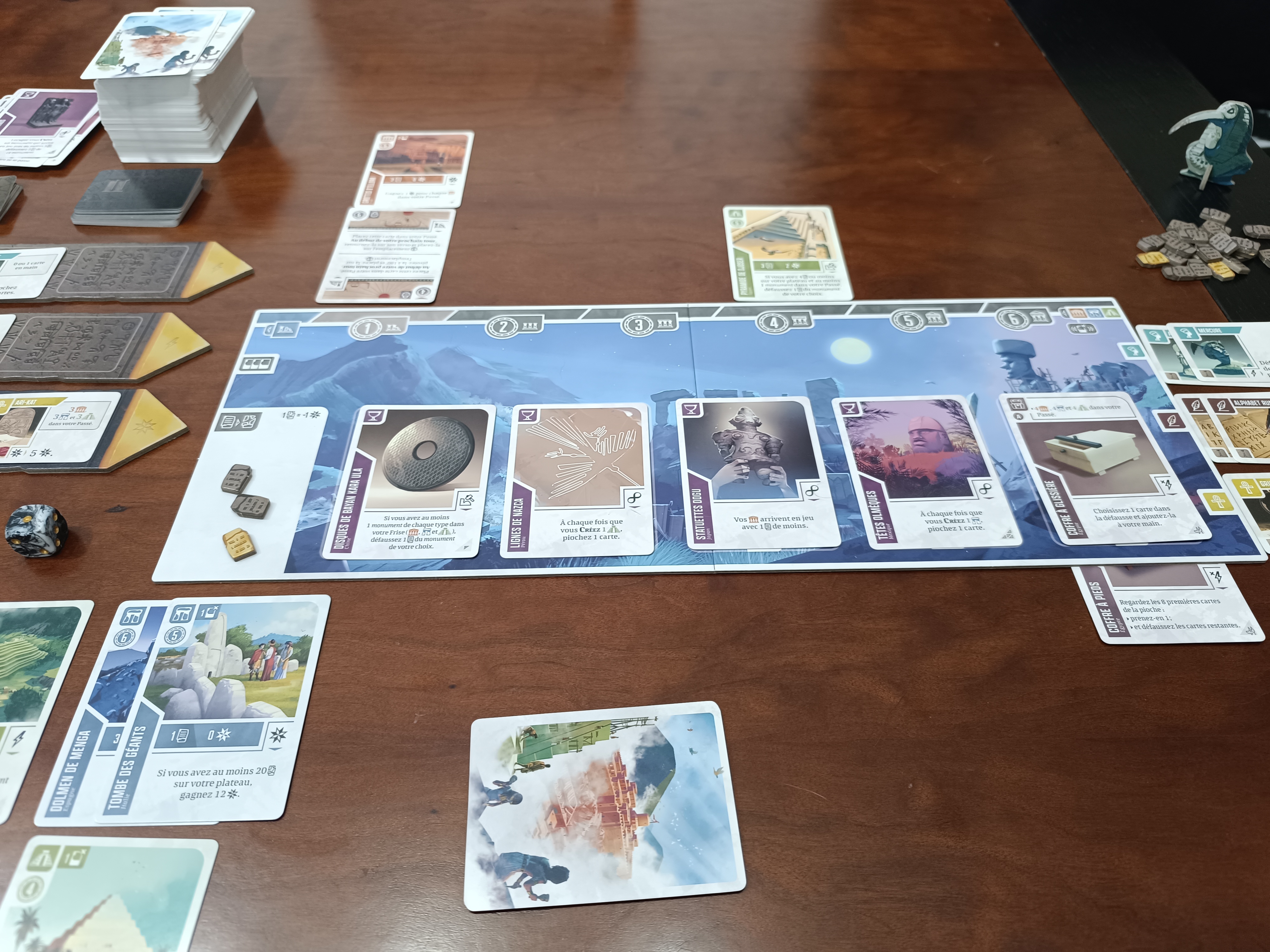 Ancient Knowledge cards and board in play