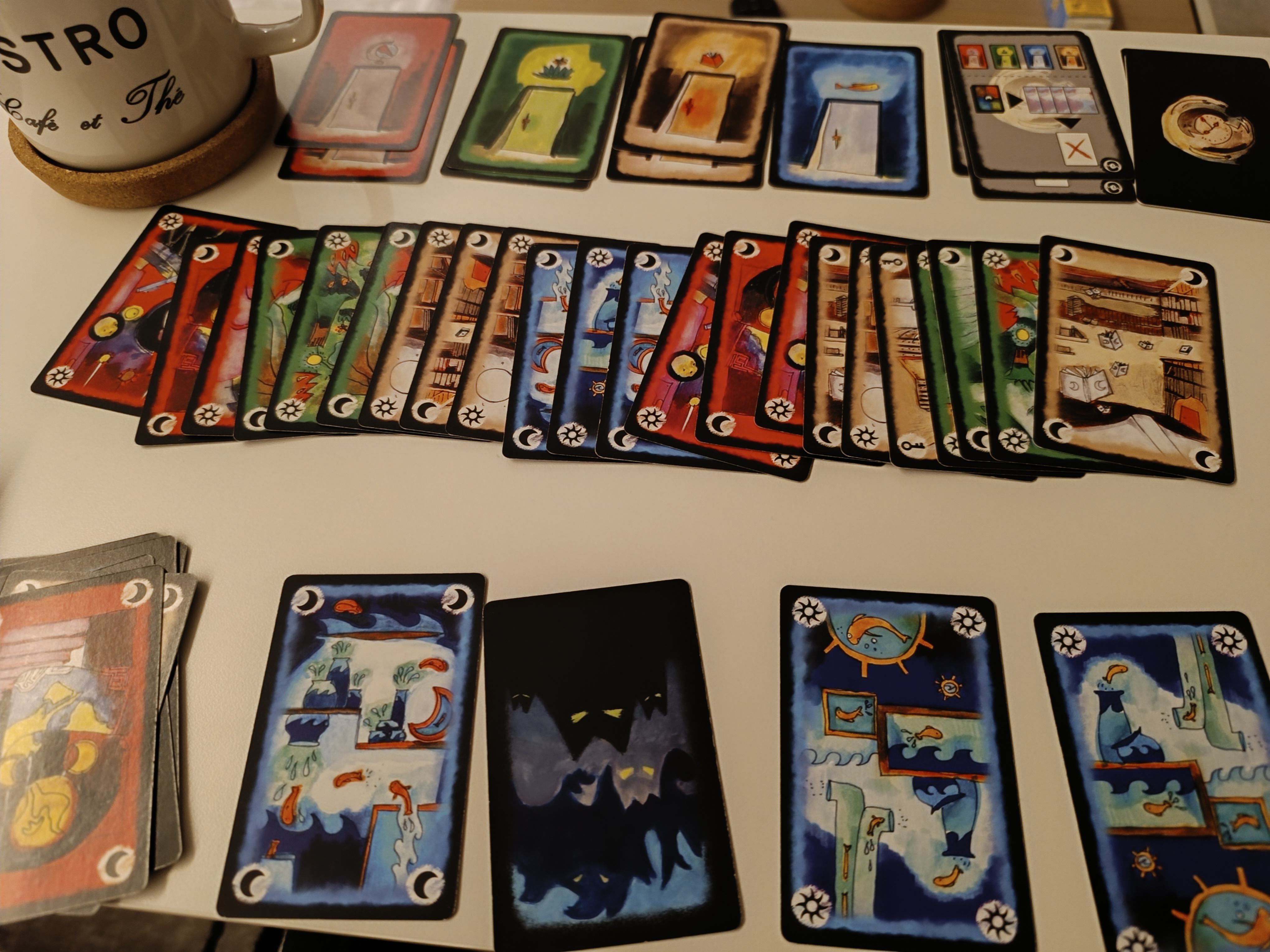 Onirim cards laid out on the table