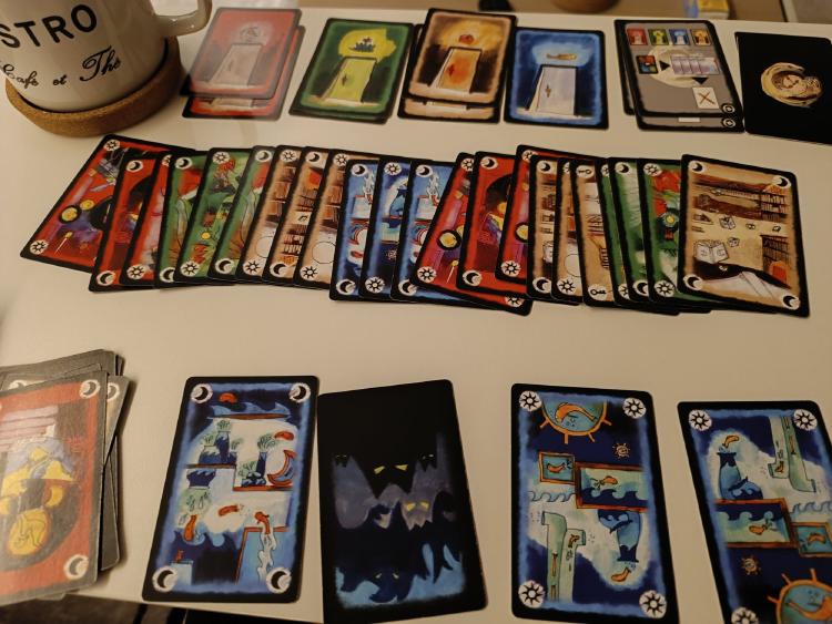 Onirim cards laid out on the table