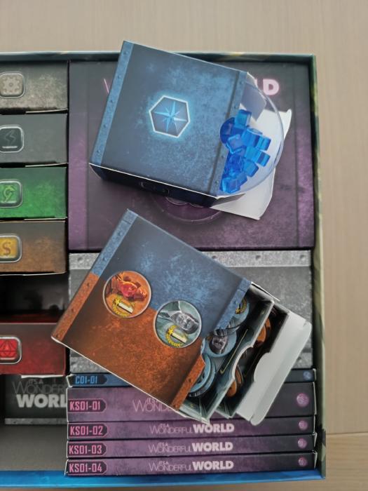 Close-up of resource cube storage compartments in the insert