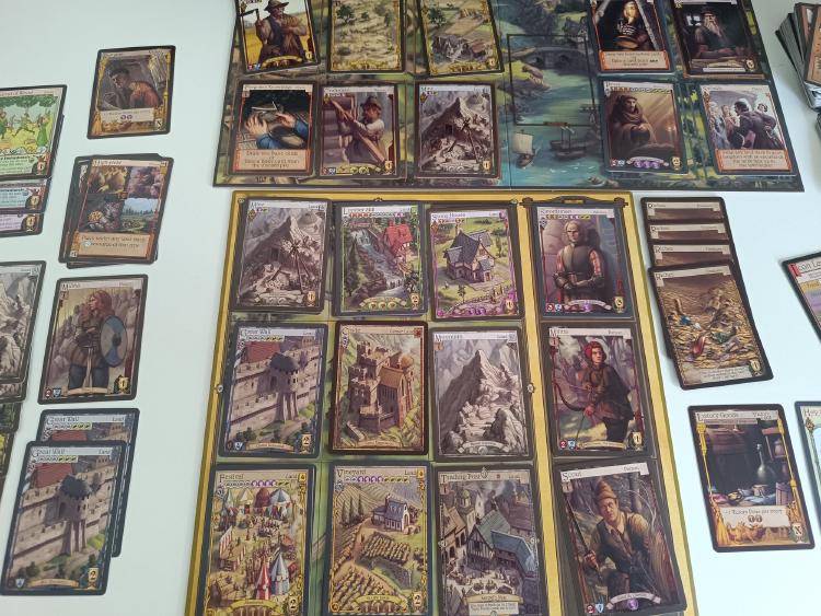 Era of Kingdoms Trade Route mini-expansion board with a river of cards