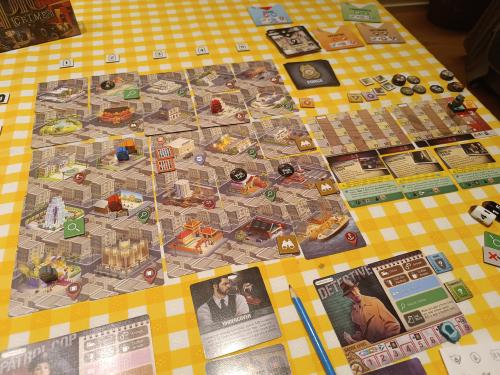 Board and cards for Tiny Epic Crimes