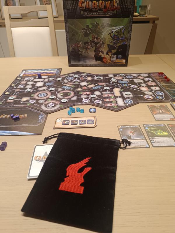 Clank! In! Space! box and board set up on the table with the ship layout, dice bag and character cards