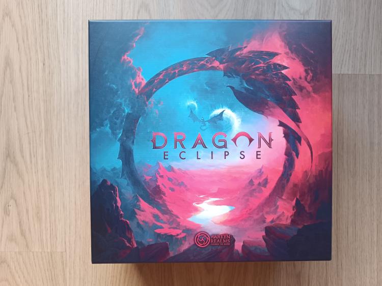 Dragon Eclipse box cover with a dragon curled around an eclipse