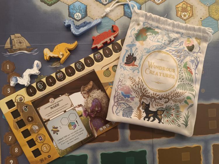Wondrous Creatures board, wooden creature tokens and illustrated bag