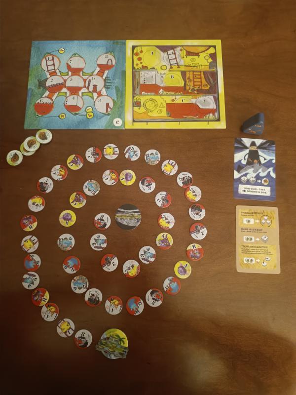 Nautilion French edition with the submarine board and The Mages expansion board side by side, a spiral of crew tokens and the Darkhouse card