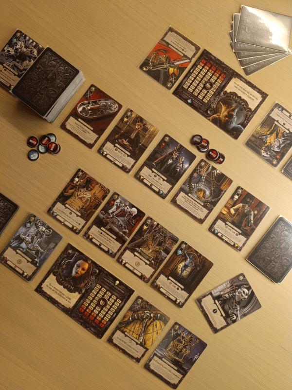 Terrors of London set up for two players, with the street of monsters between the two Overlord boards