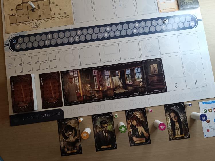 A T.I.M.E Stories room panorama laid out on the board, with the four characters and their cards below